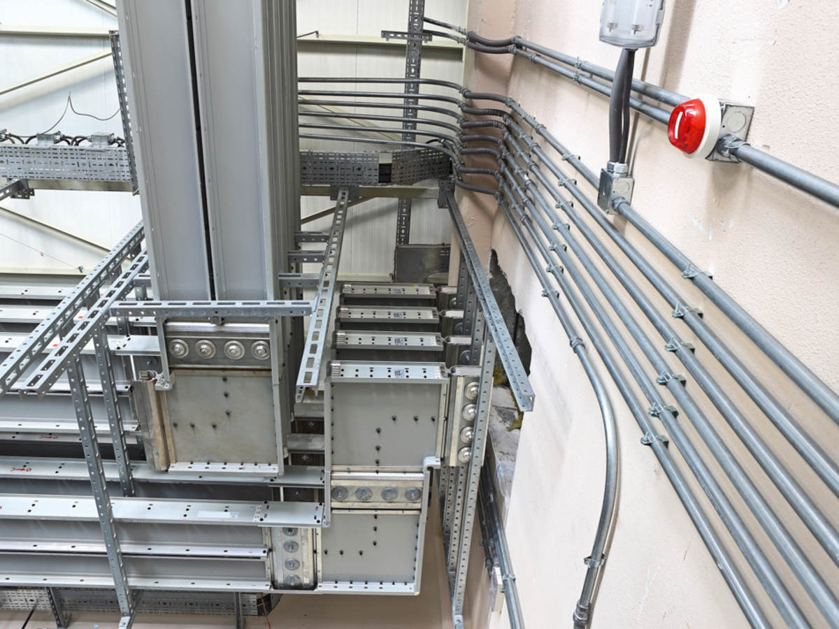 What are the advantages and disadvantages of electrical conduit wiring systems?